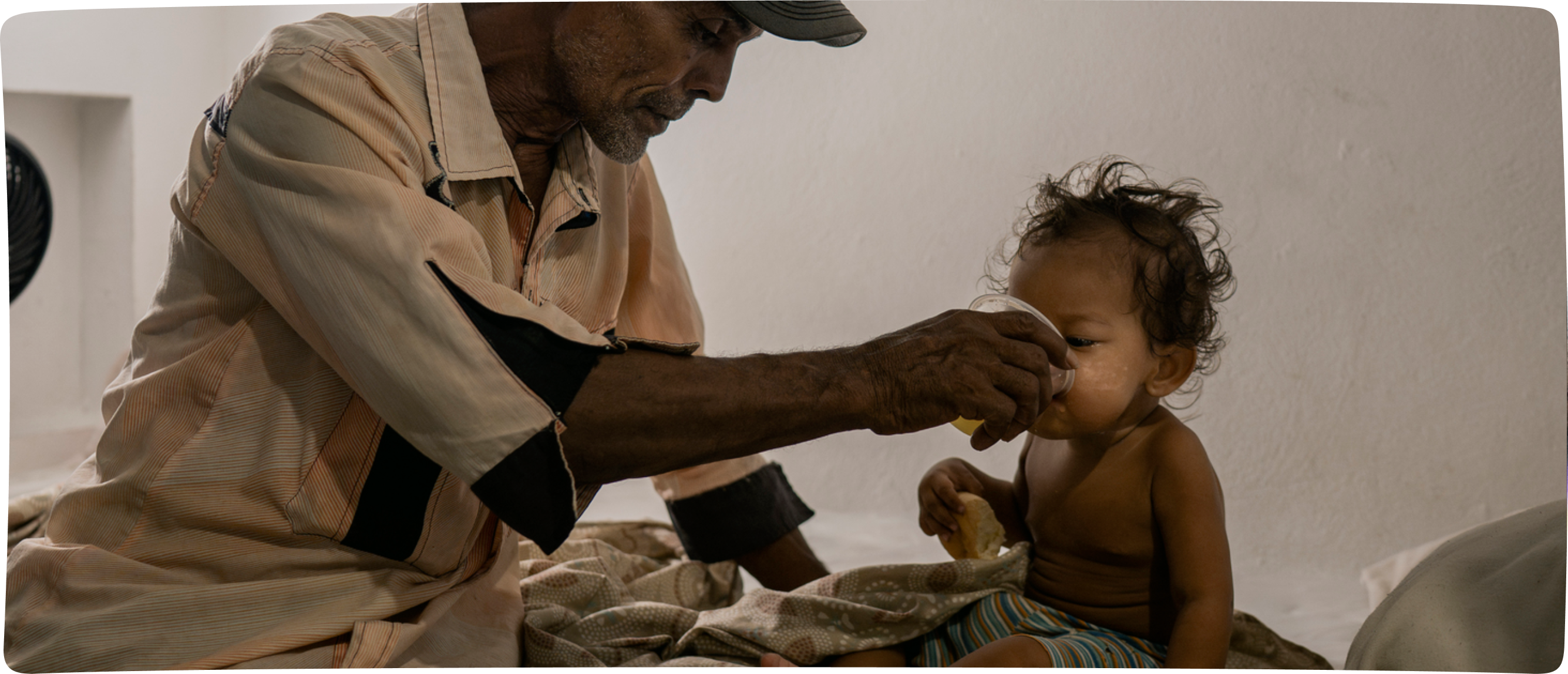 Child Drinking out of Cup